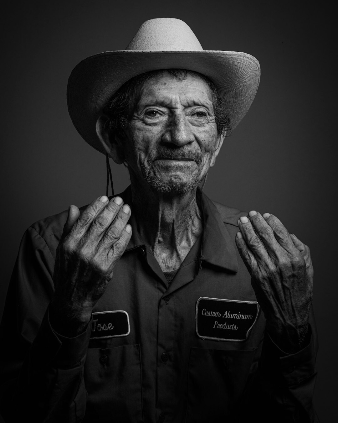 Studio portrait of a retired male engineer in his 60s